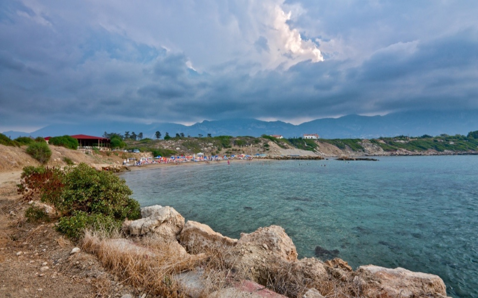 Diana Beach at Çatalköy with its rugged shoreline and mountain backdrop