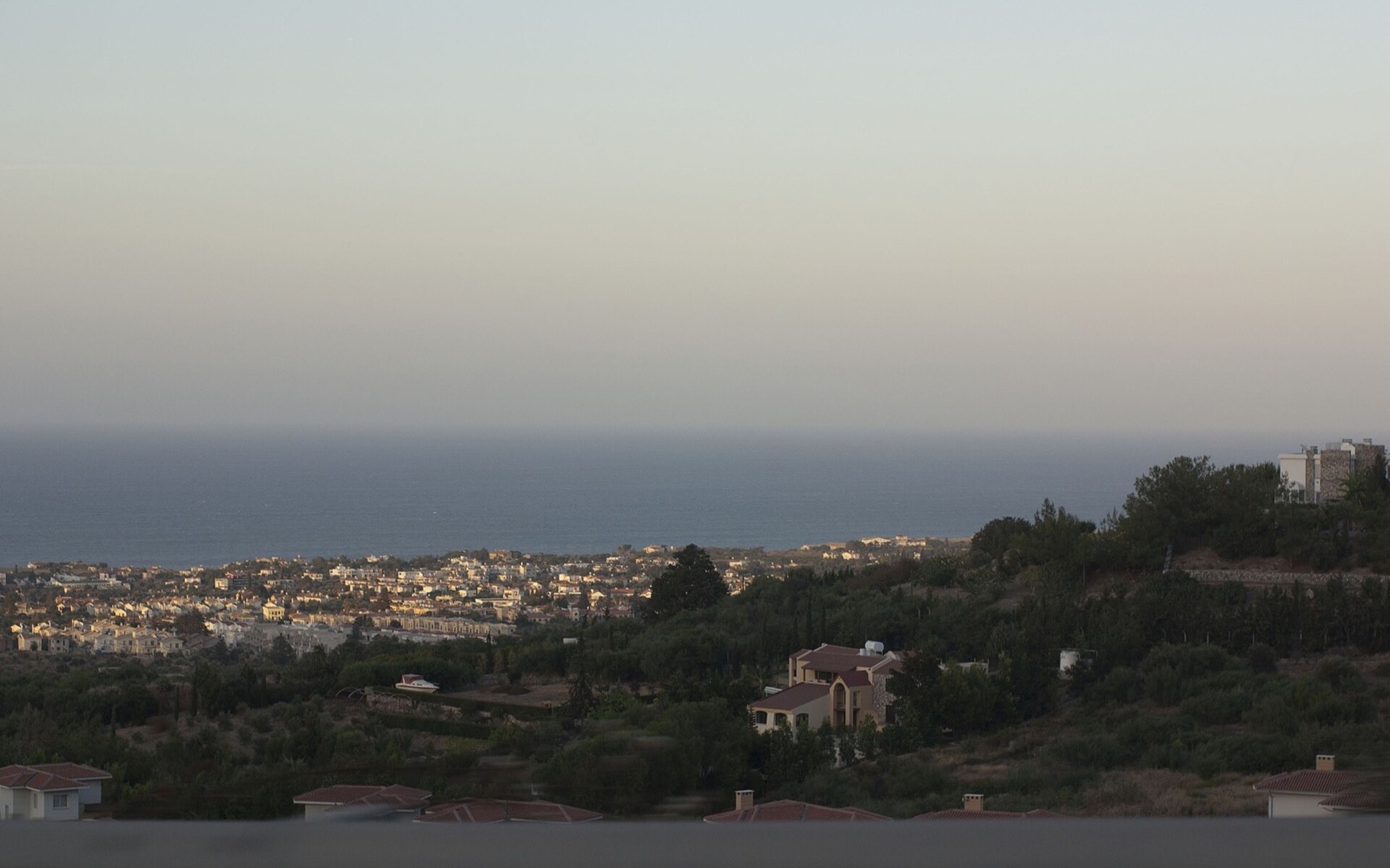 The residential slopes of historic Thermeia and Doğanköy looking towards the sea
