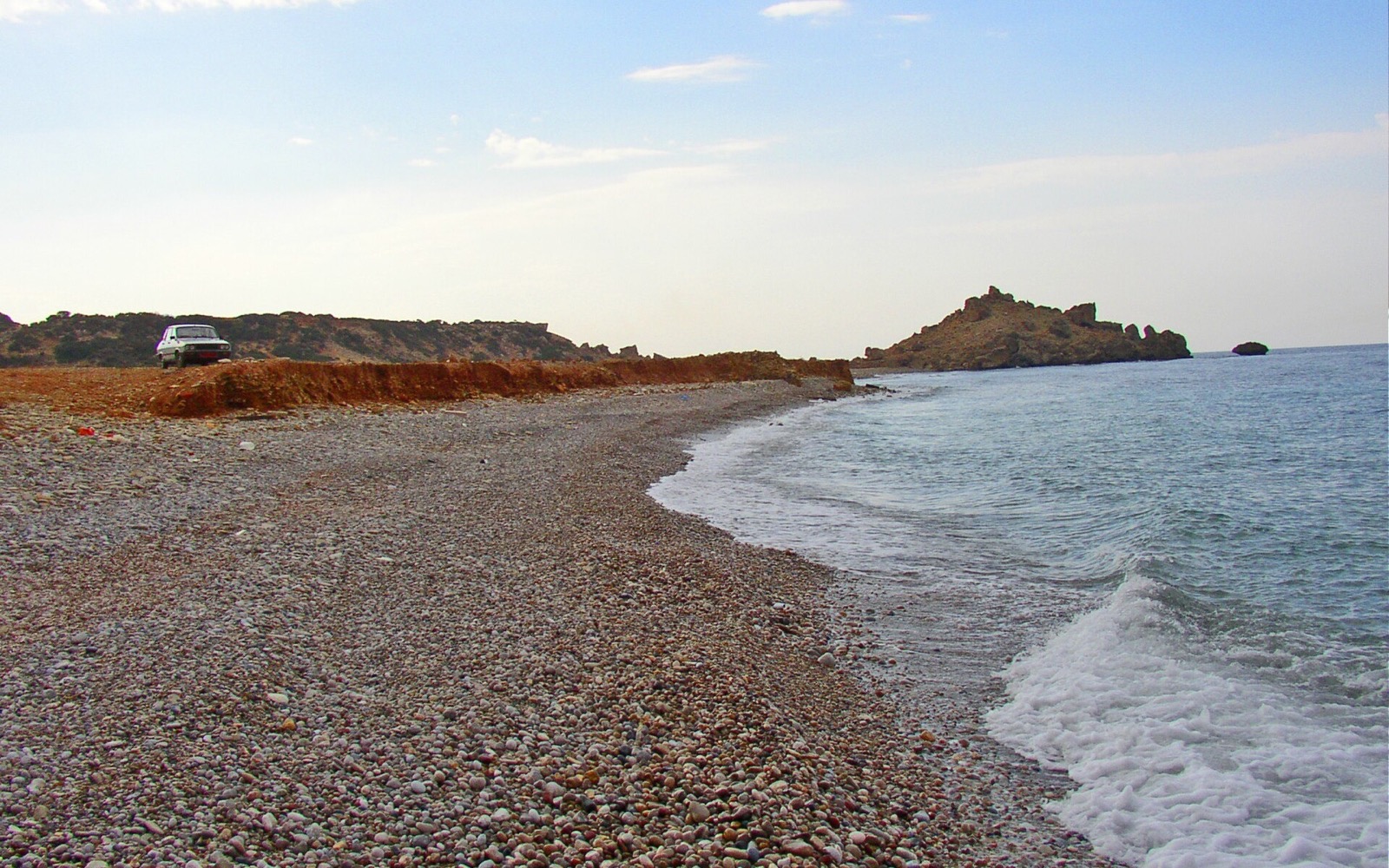 The rugged pebble shoreline east of Esentepe