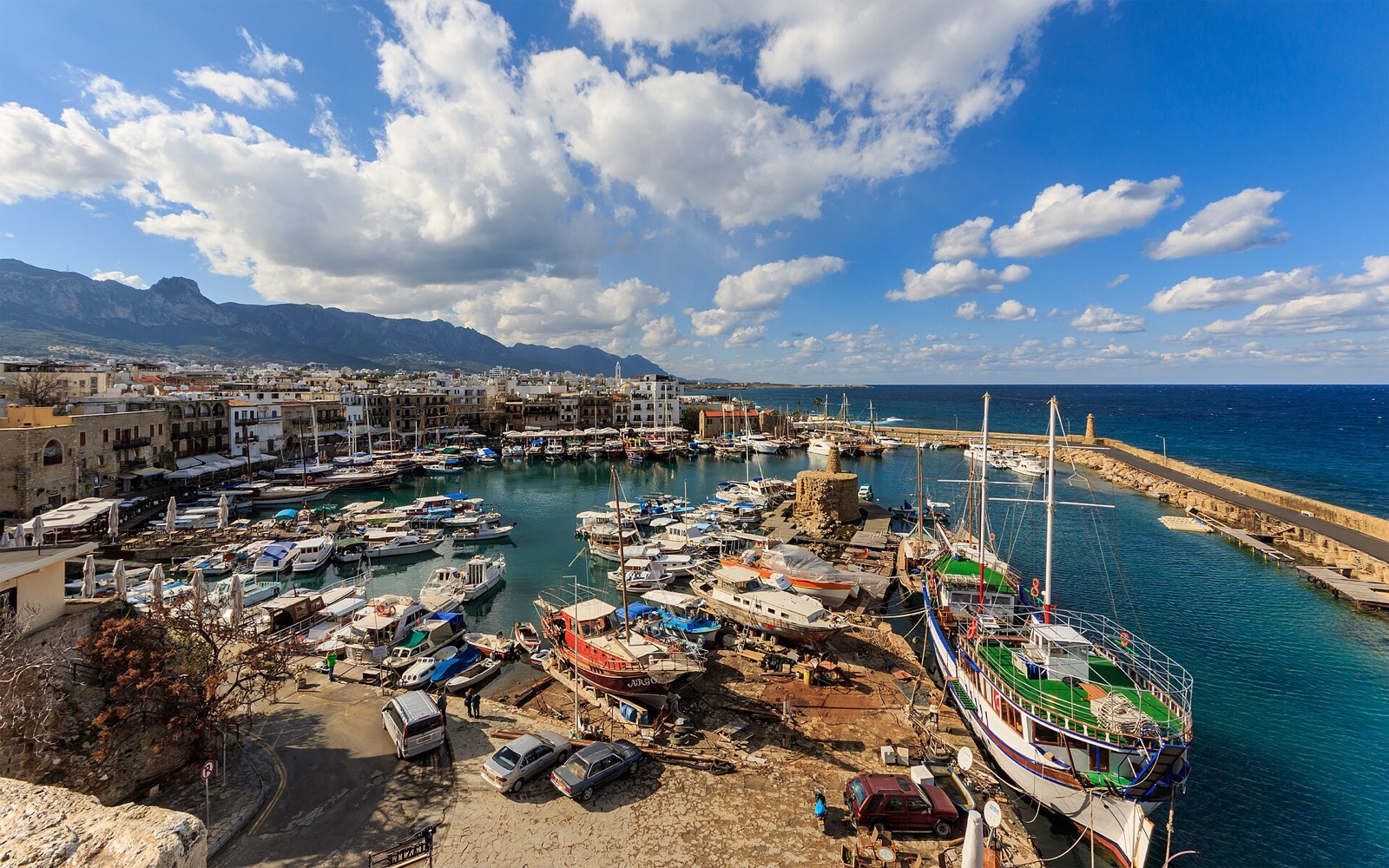 Girne Old Harbour, the castle and the Kyrenia mountain backdrop