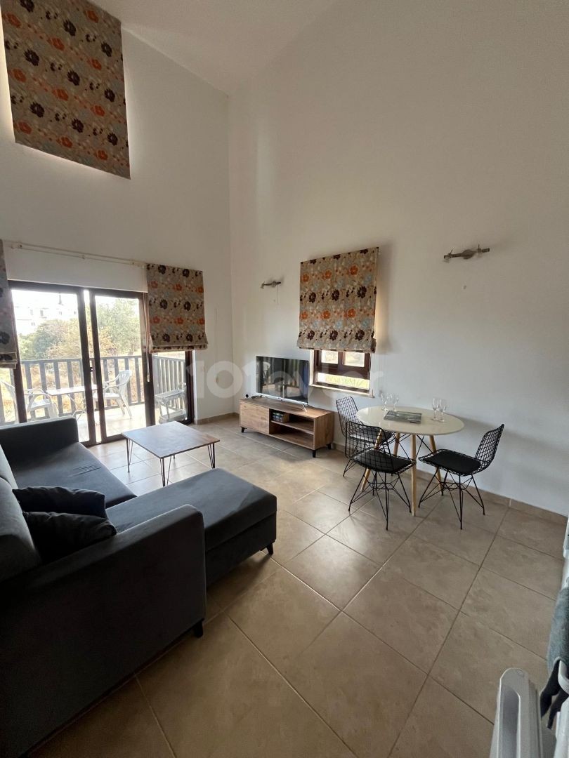 Apartment mit 2 Schlafzimmern und Meerblick in Ozanköy — Chapter One Realty
